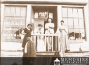 Villagers outside James Bean Store