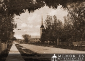 Main Street facing West with St. Raphael's Catholic Church in background
