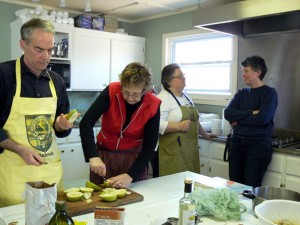 Kenneth MacIntosh and Alice Bryenton prepare cream cheese stuffed pears. Darlene Jardine asks gardening questions of guest speaker, Lucie Chiasson, regional wellness consultant for the Department of Healthy and Inclusive Communities, farmer, and founder of the Food Security Network.