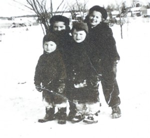 I believe the above picture of the four of us was taken somewhere by the MacCormack house. Marjorie and Katharine are standing behind me and Johnny. Smiles all around!