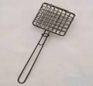 A wire soap shaker from the 1950s.  A cake of soap would be put in the wire basket, then swished in the dishpan to make soap suds to wash the dishes