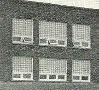 The above picture shows the glass block windows in my grade ten classroom on the second floor of the new brick school building