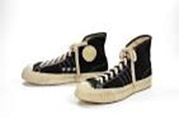 1950s style Converse high top sneakers, with the circle of white rubber at the ankle