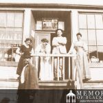 Villagers outside James Bean Store